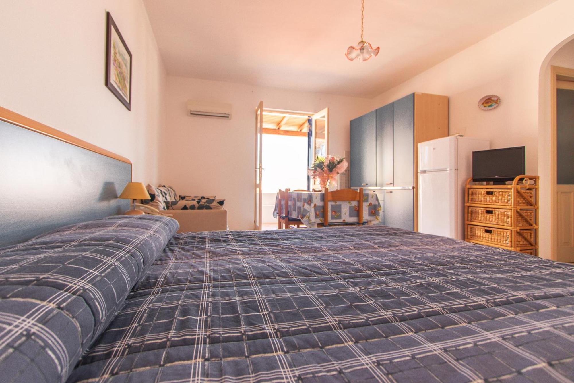 Hotel Residence La Villetta Кането Стая снимка