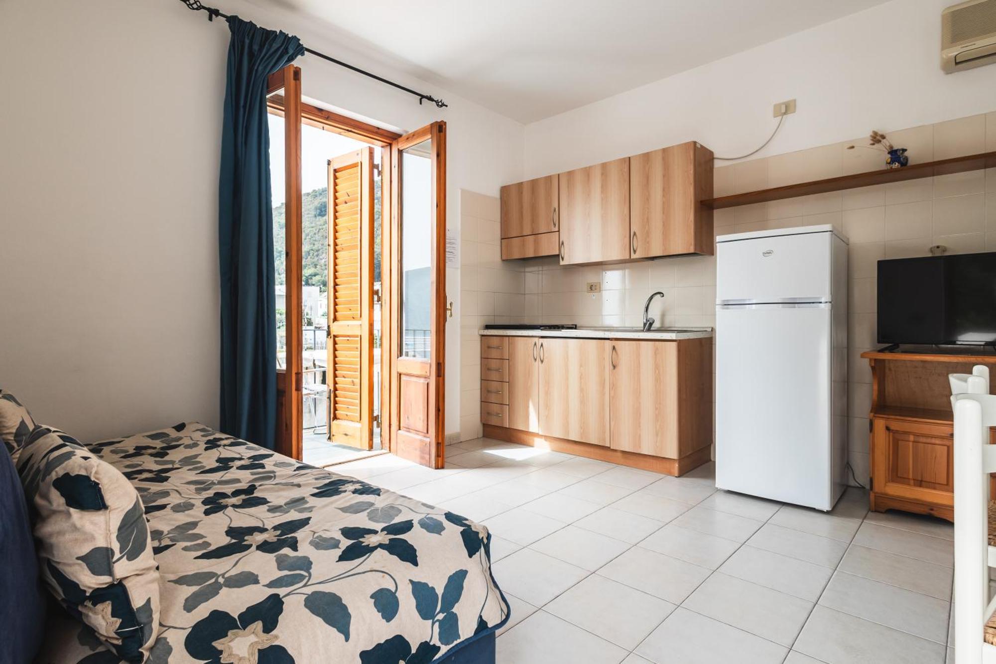 Hotel Residence La Villetta Кането Стая снимка