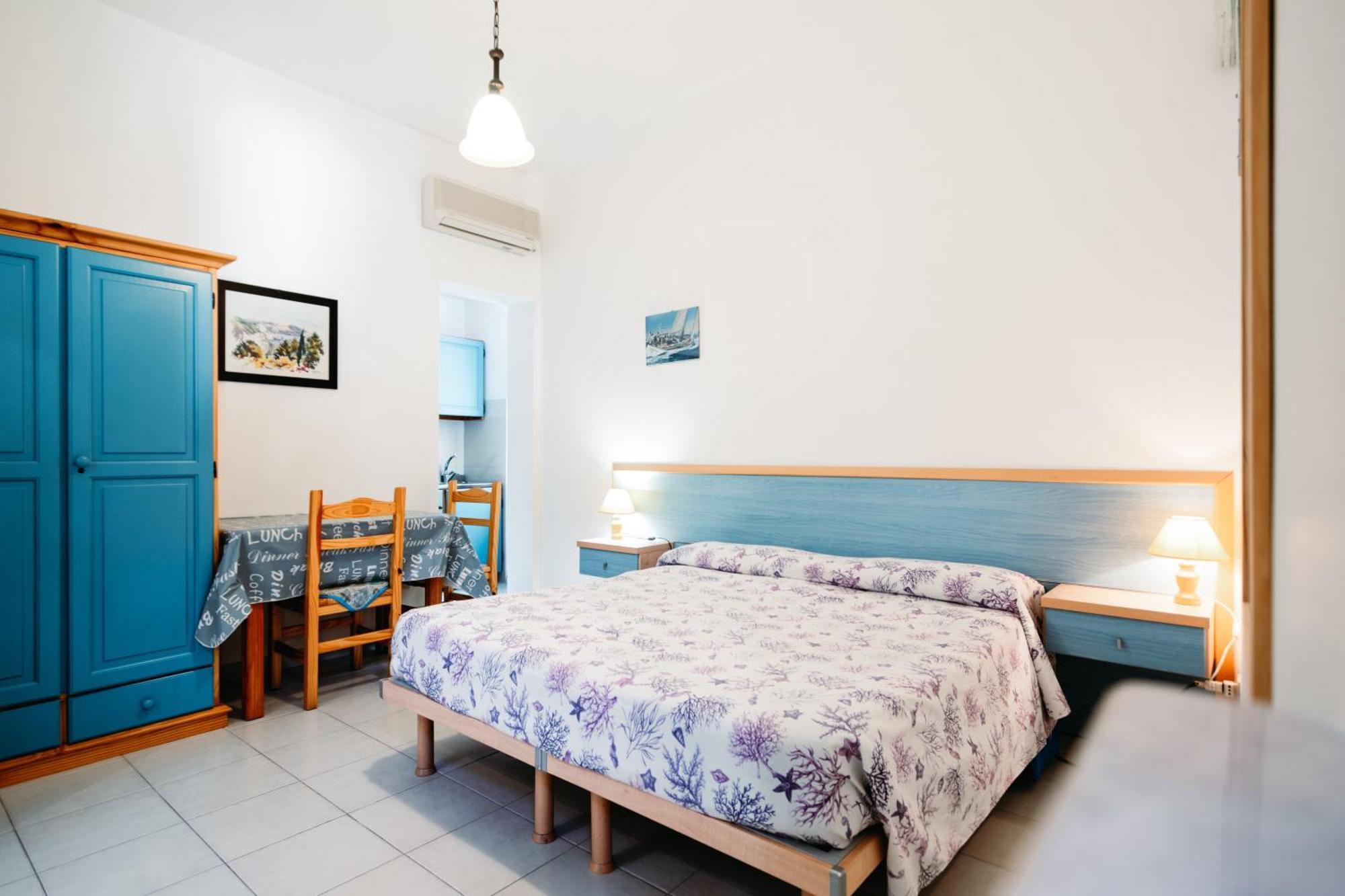 Hotel Residence La Villetta Кането Стая снимка