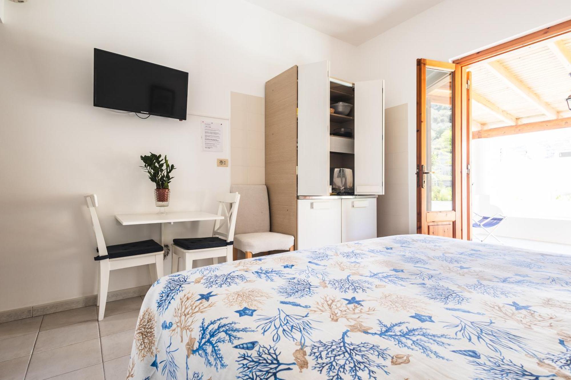 Hotel Residence La Villetta Кането Стая снимка